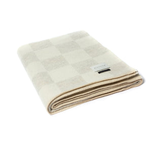 The Blacksaw Checkerboard Crosby Blanket in Shoji Beige Colour product shot with beautiful Blanket Stitching