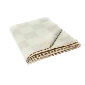 The Blacksaw Checkerboard Crosby Blanket in Shoji Beige Colour folded product shot with beautiful Blanket Stitching
