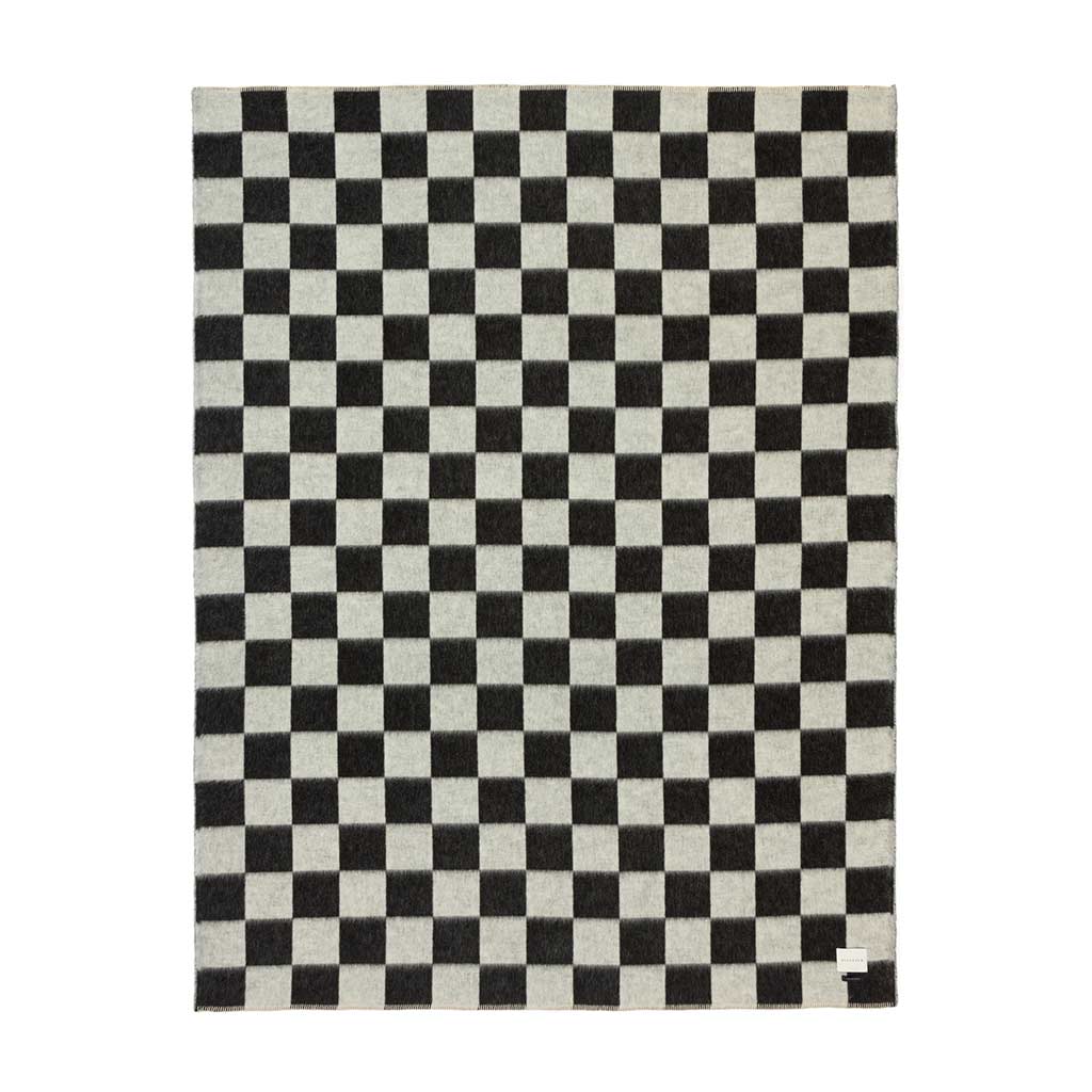 Blacksaw Checkerboard Blanket laying Flat showing the Crosby Blanket in black and white