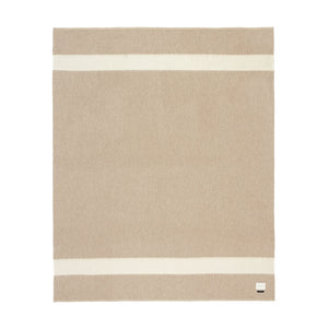 The Blacksaw 100% Recycled Siempre Blanket  laying flat in Beige with Ivory Stripe