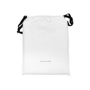 This Beautiful White Blacksaw Branded Cotton Duster Bag with Black branding and ties, comes with every blanket and throw. 