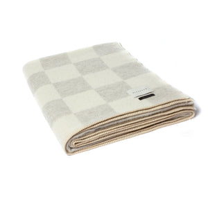 The Blacksaw Checkerboard Crosby Blanket in Light heather Grey and White folded product shot with beautiful Blanket Stitching
