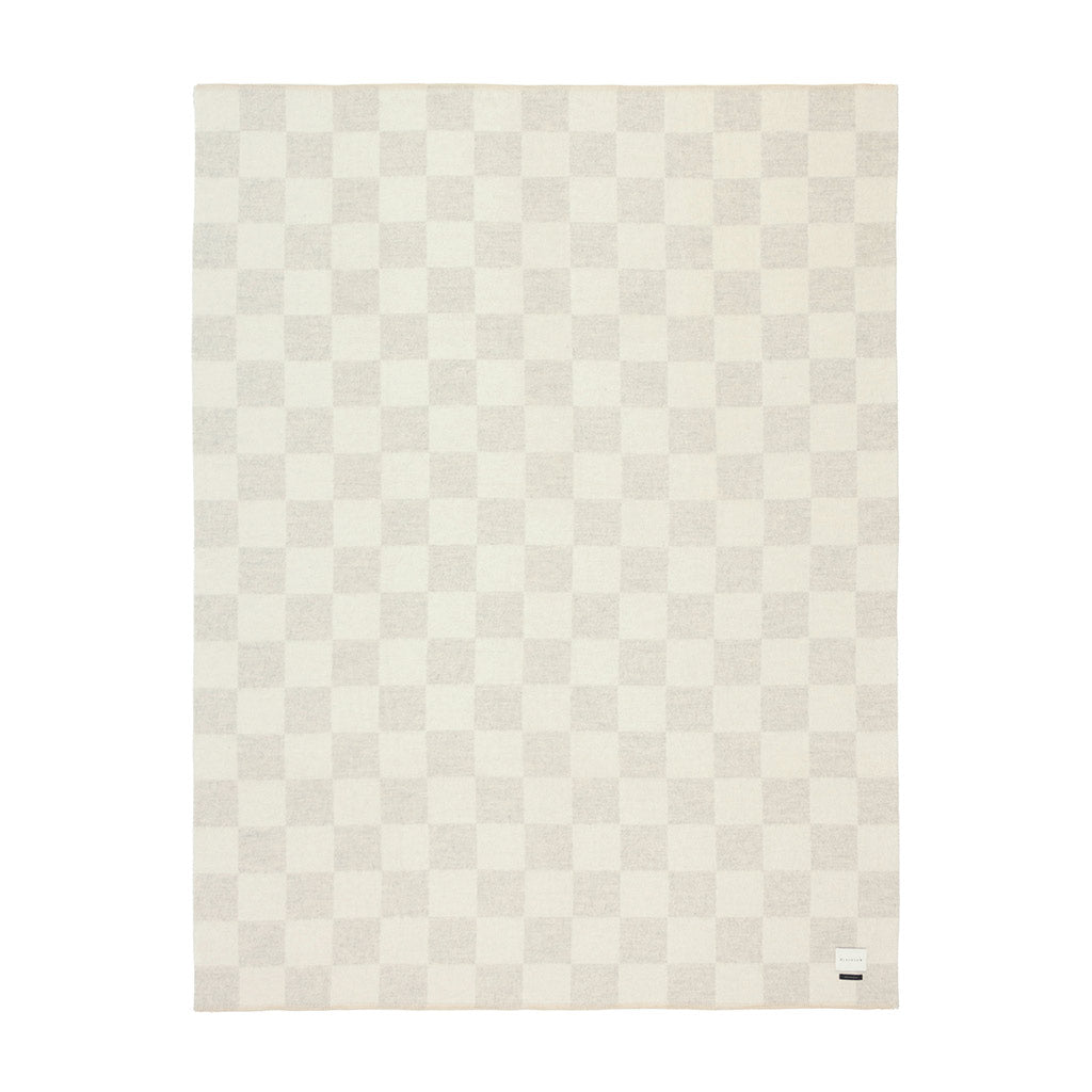 The Blacksaw Checkerboard Crosby Blanket in Shoji Beige, Flat laying product shot