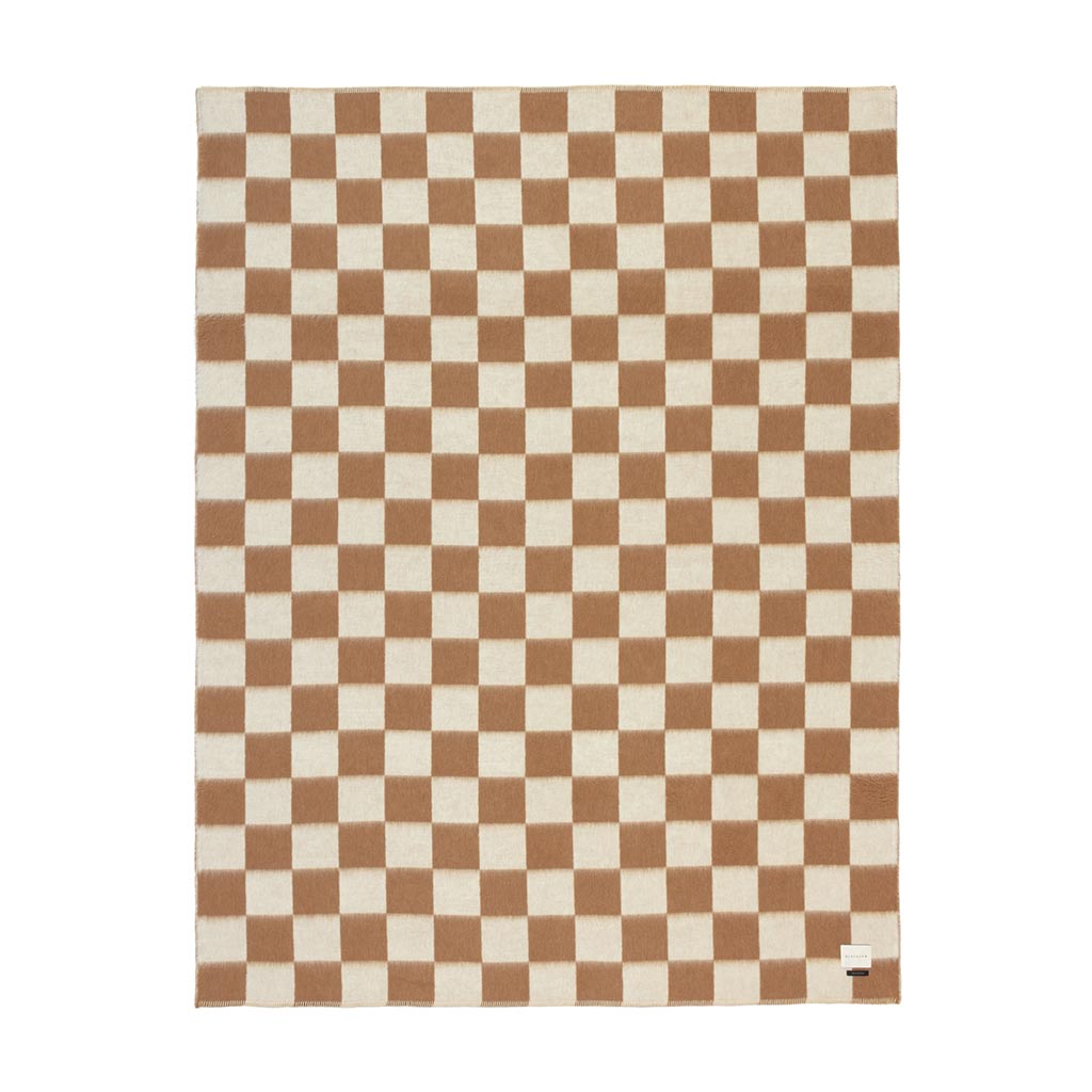 The Blacksaw Checkerboard Crosby Blanket in Tabacco Brown, Flat laying product shot