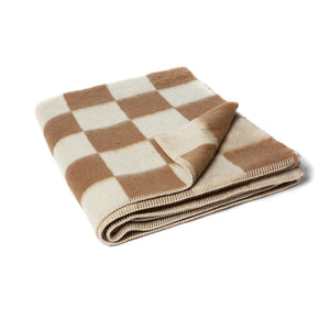 The Blacksaw Checkerboard Crosby Blanket inTabacco Brown Colour folded product shot with beautiful Blanket Stitching
