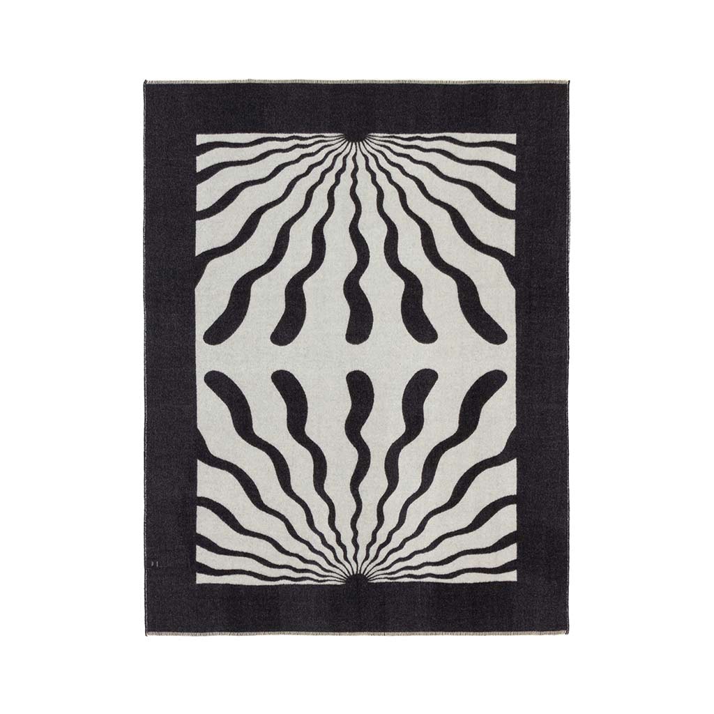 The Blacksaw Dopamine Psychedelic Art Blanket in Black/Ivory Flat laying product shot Reverse side