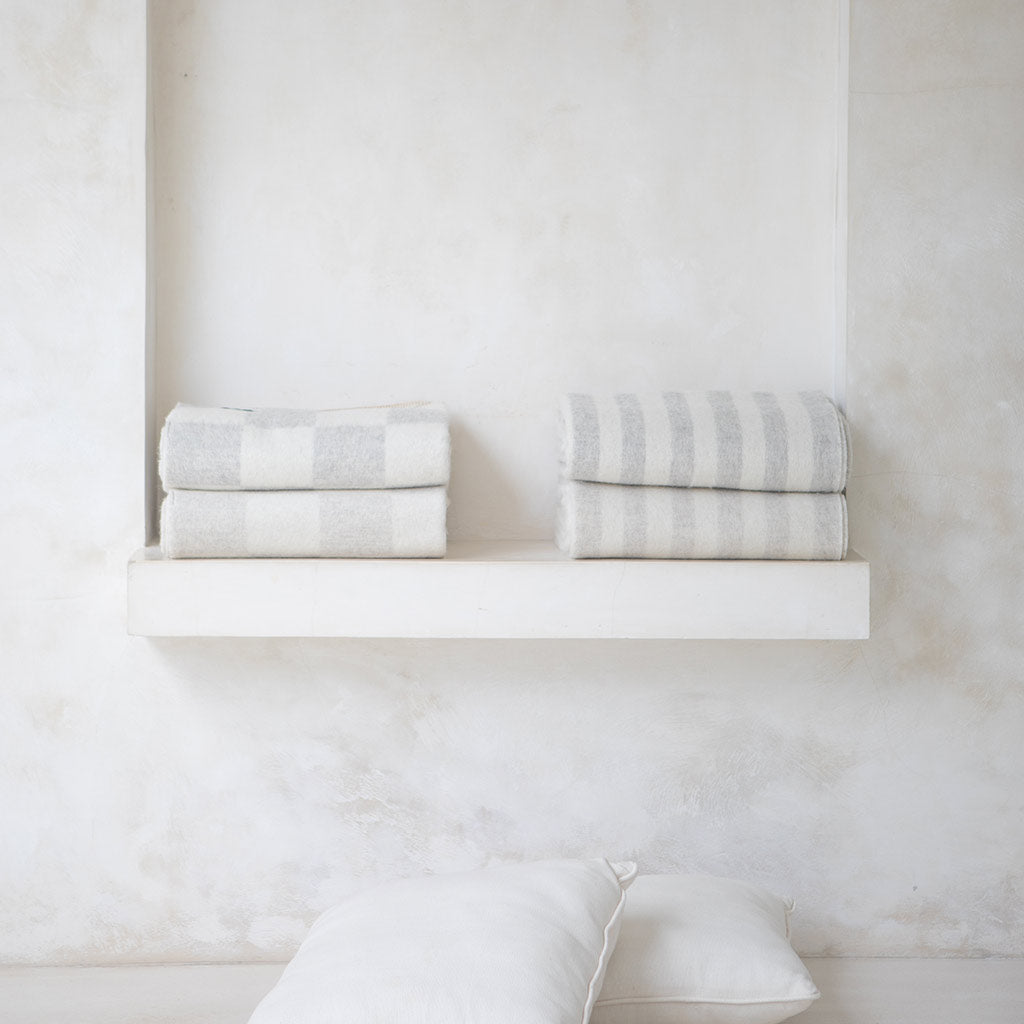 The Blacksaw Checkerboard Crosby Blanket in Shoji Beige, Flat laying product shot