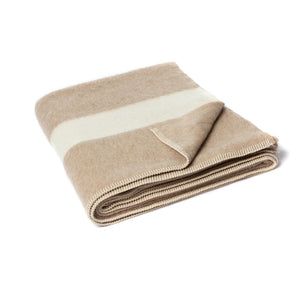 The Blacksaw 100% Recycled Siempre Blanket in Beige with Ivory Stripe folded product shot with beautiful Blanket Stitching