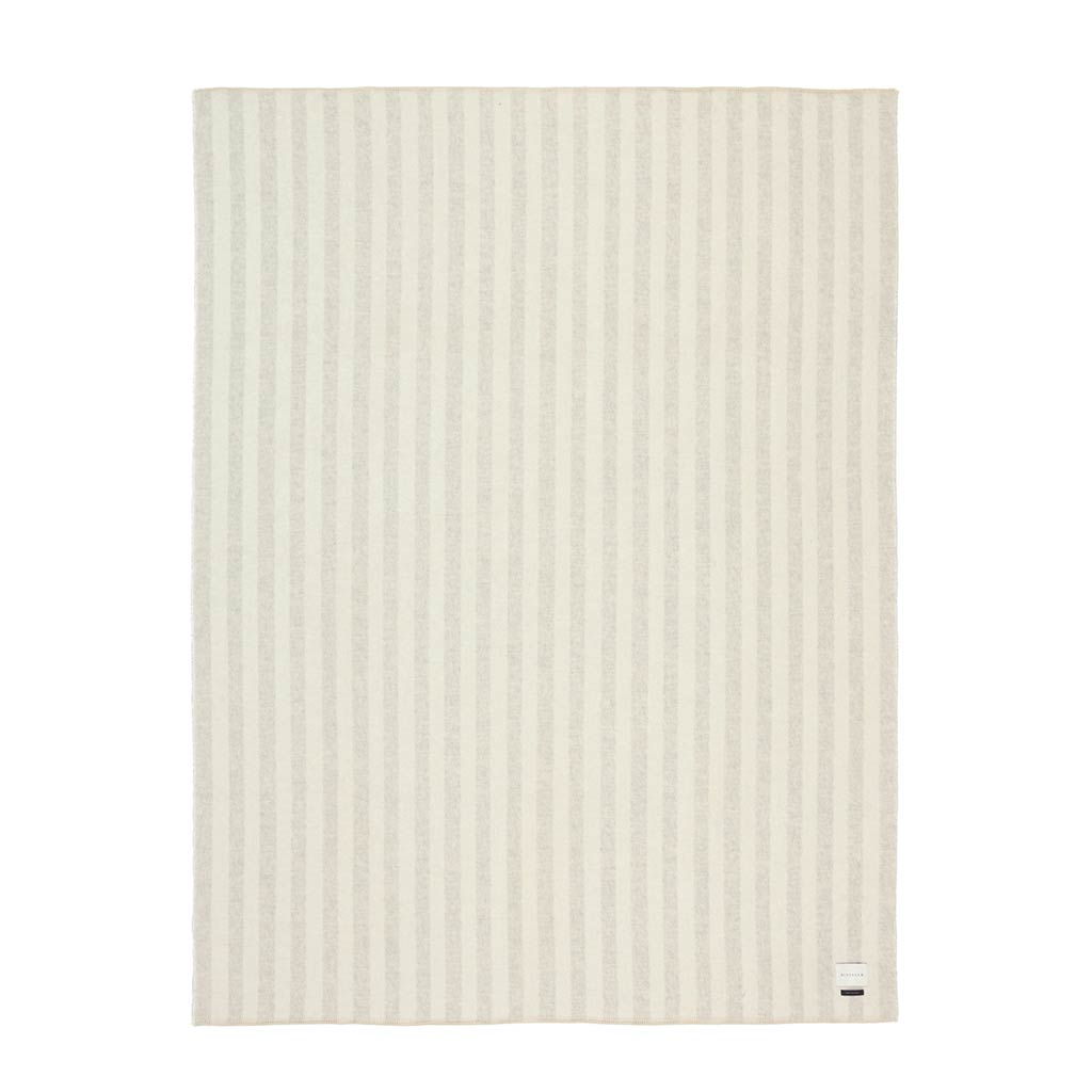 The Blacksaw Stills Vertical Stripe Blanket in Shoji Beige/Ivory Flat laying product shot