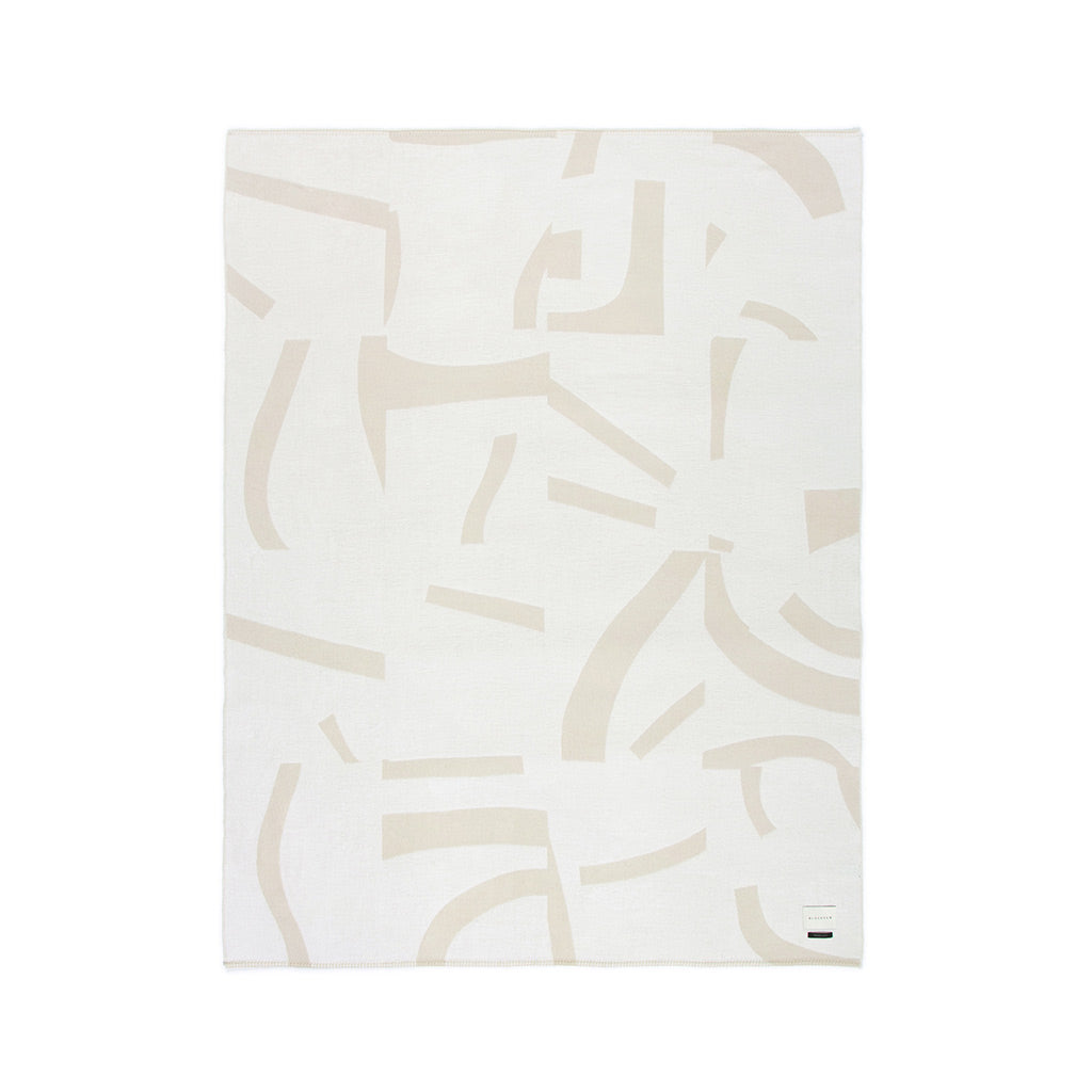 Blacksaw Visions Reversible Throw Optic/Plaster is made from humanely shorn in 100% Baby Alpaca is a Blanket that couples as wall art.